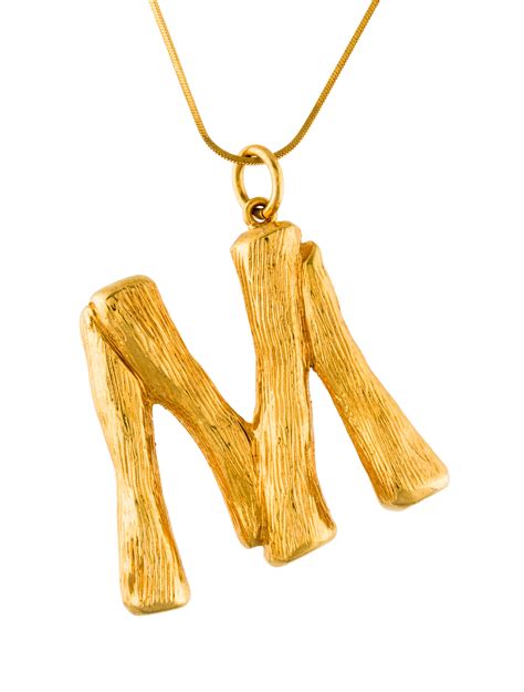 celine buchstabenkette v|Alphabet V Necklace in Brass with Gold finish .